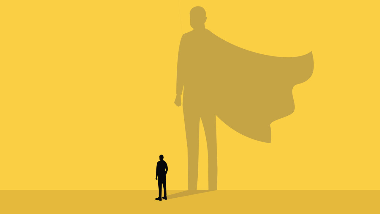 illustration på en person som står mot en vägg med superman-skugga