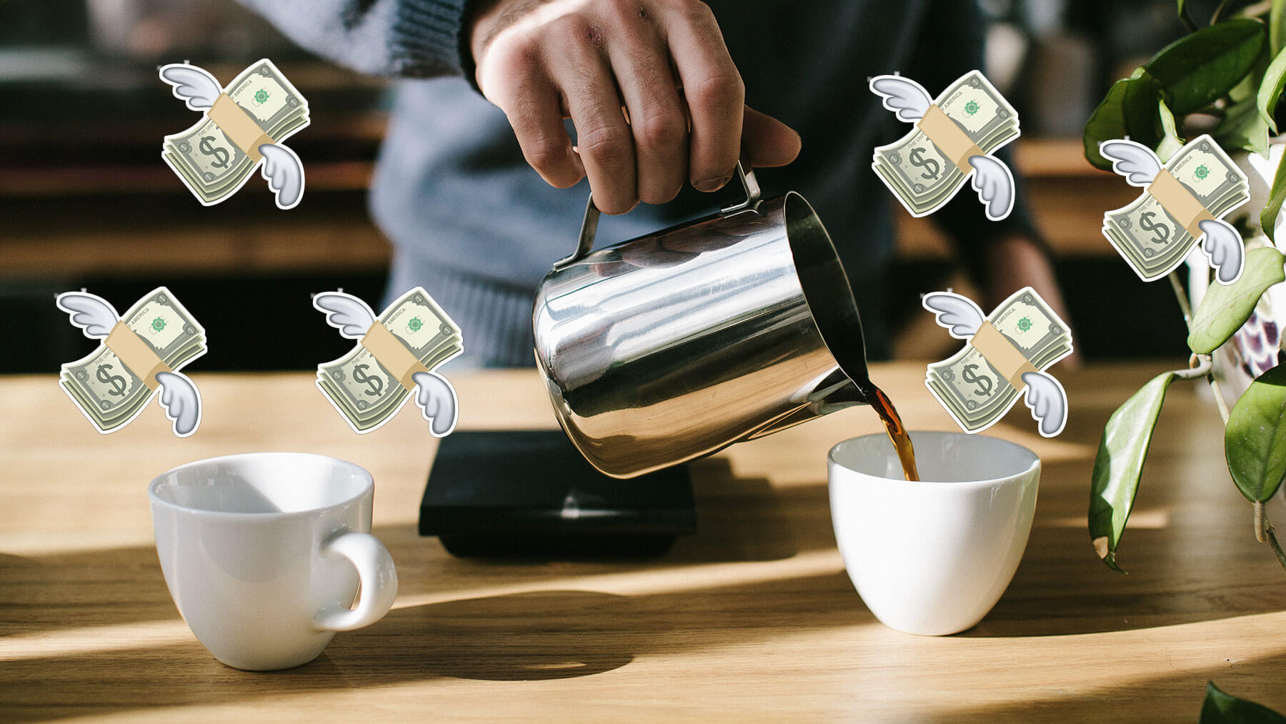 Kaffekopp med flygande penga-emojis